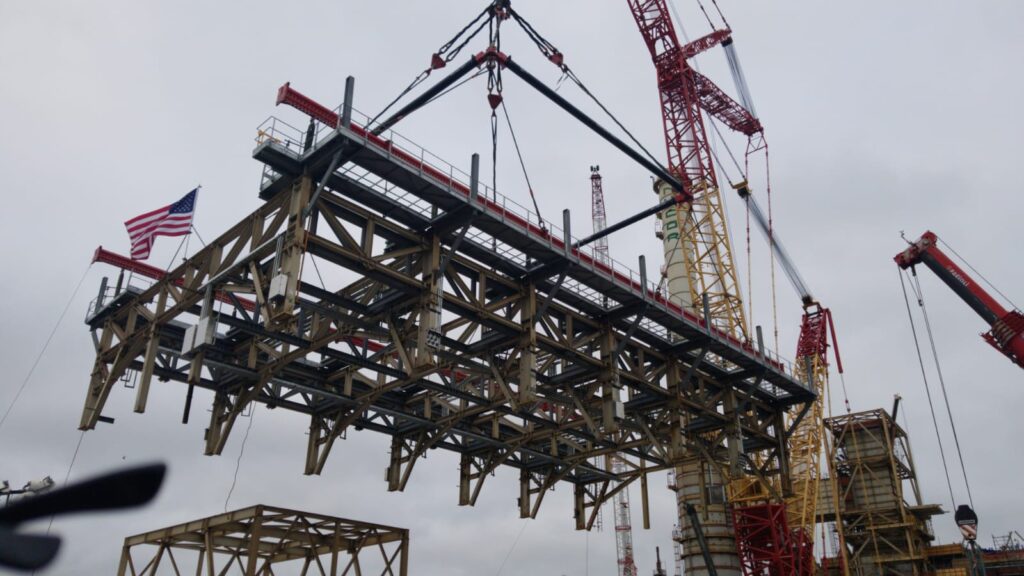 conventional beams framed to lift platform